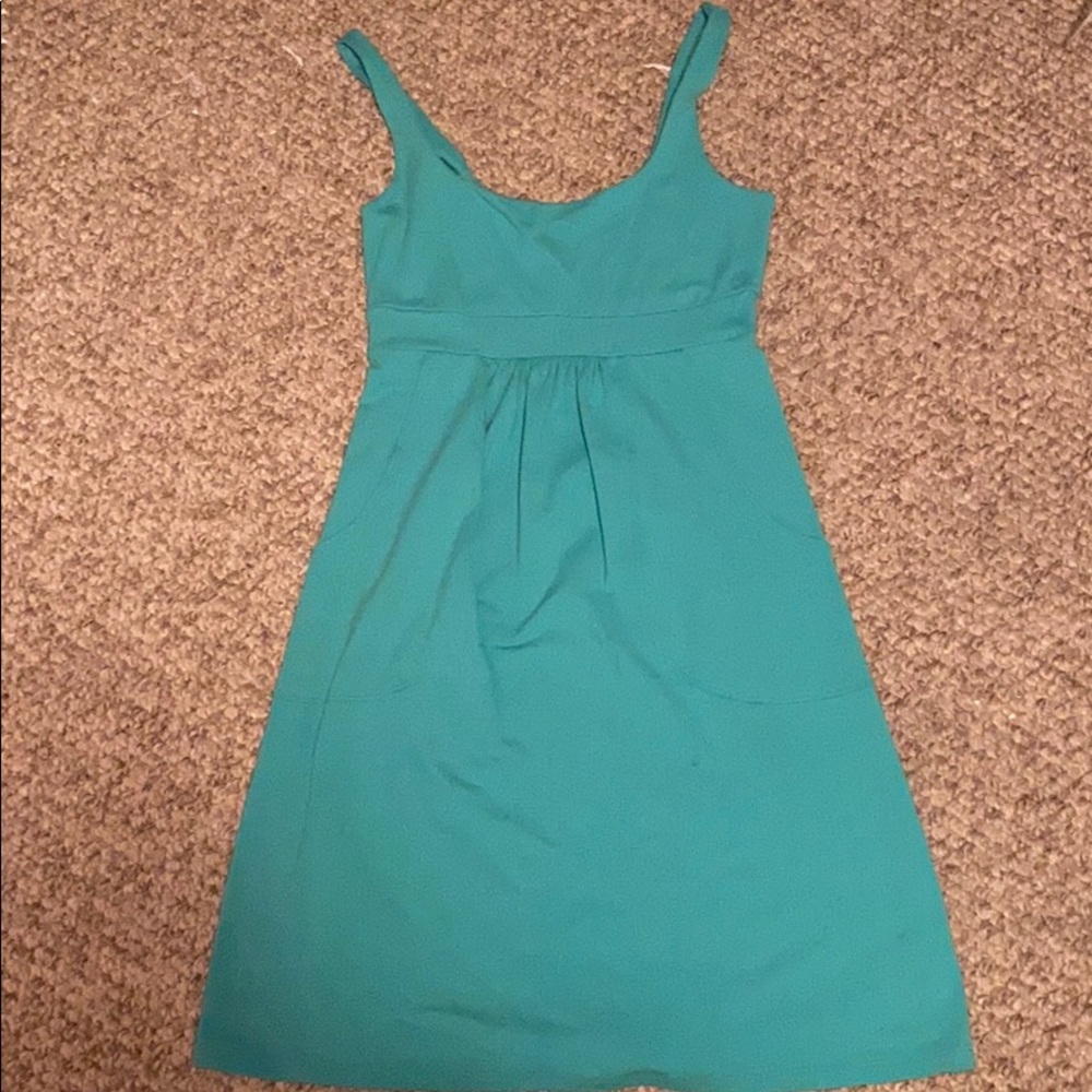 teal dress with pockets